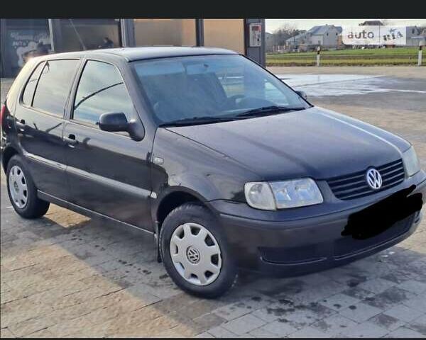 Чорний Фольксваген Поло, об'ємом двигуна 1.4 л та пробігом 200 тис. км за 2999 $, фото 1 на Automoto.ua
