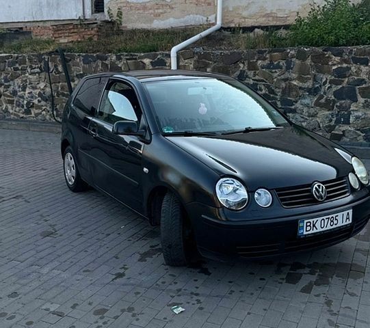 Чорний Фольксваген Поло, об'ємом двигуна 1.4 л та пробігом 96 тис. км за 3300 $, фото 1 на Automoto.ua