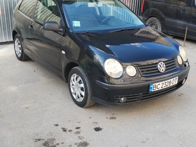 Черный Фольксваген Поло, объемом двигателя 1.2 л и пробегом 245 тыс. км за 2350 $, фото 1 на Automoto.ua