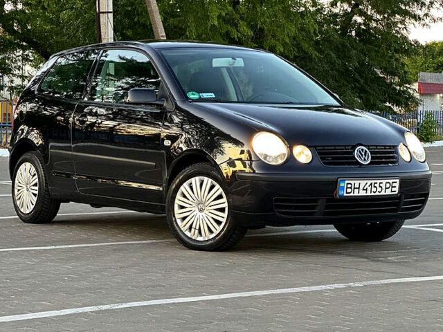 Черный Фольксваген Поло, объемом двигателя 1.2 л и пробегом 192 тыс. км за 3300 $, фото 1 на Automoto.ua