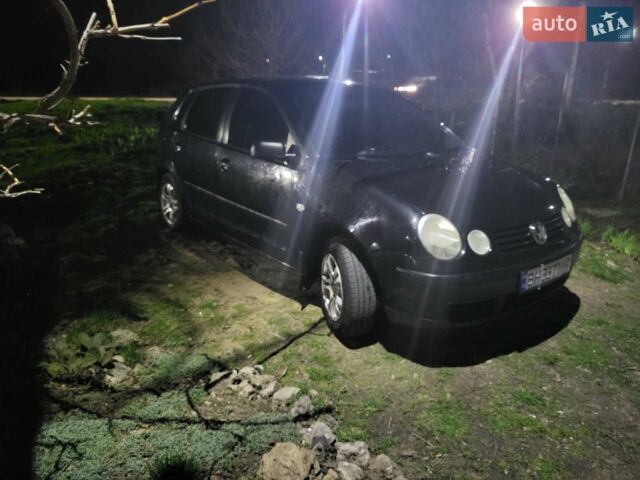 Черный Фольксваген Поло, объемом двигателя 1.39 л и пробегом 212 тыс. км за 4500 $, фото 1 на Automoto.ua