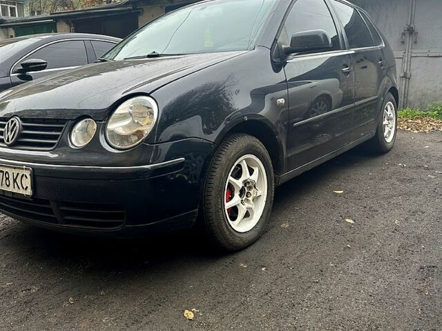 Чорний Фольксваген Поло, об'ємом двигуна 1.2 л та пробігом 230 тис. км за 2800 $, фото 1 на Automoto.ua