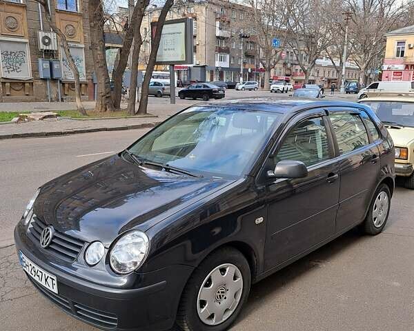 Черный Фольксваген Поло, объемом двигателя 1.2 л и пробегом 187 тыс. км за 5100 $, фото 1 на Automoto.ua