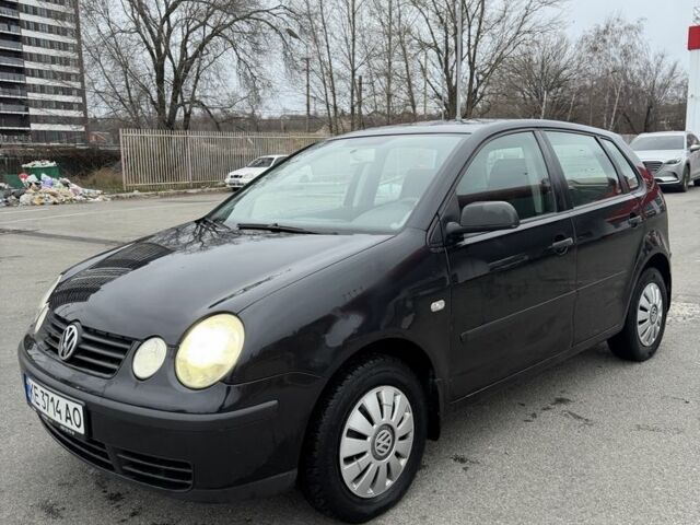 Черный Фольксваген Поло, объемом двигателя 1.4 л и пробегом 221 тыс. км за 3650 $, фото 1 на Automoto.ua