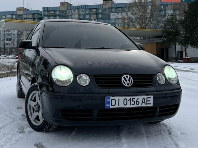 Черный Фольксваген Поло, объемом двигателя 1.4 л и пробегом 206 тыс. км за 5200 $, фото 1 на Automoto.ua