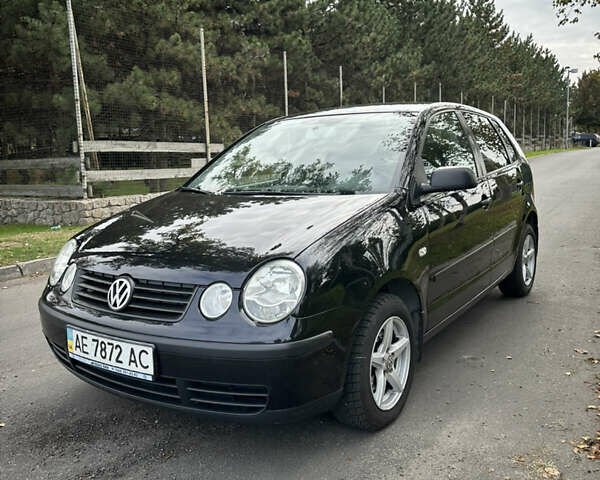 Черный Фольксваген Поло, объемом двигателя 1.4 л и пробегом 190 тыс. км за 5200 $, фото 1 на Automoto.ua