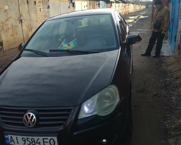Чорний Фольксваген Поло, об'ємом двигуна 1.4 л та пробігом 150 тис. км за 5100 $, фото 1 на Automoto.ua
