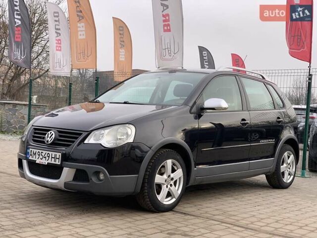Черный Фольксваген Поло, объемом двигателя 1.4 л и пробегом 153 тыс. км за 6255 $, фото 1 на Automoto.ua