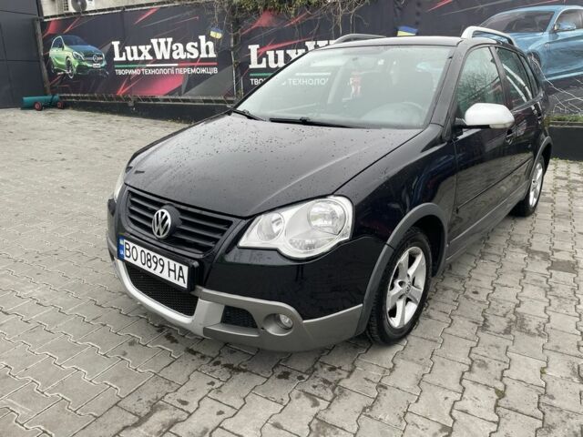 Черный Фольксваген Поло, объемом двигателя 1.4 л и пробегом 119 тыс. км за 6150 $, фото 1 на Automoto.ua