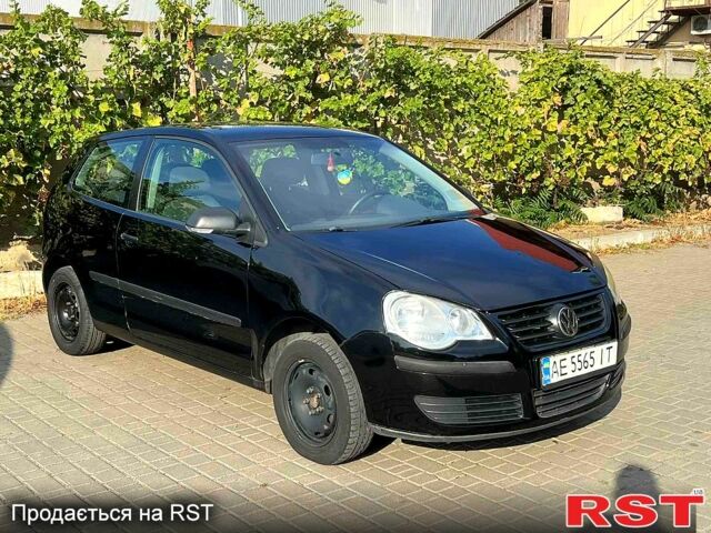 Черный Фольксваген Поло, объемом двигателя 1.4 л и пробегом 210 тыс. км за 3399 $, фото 1 на Automoto.ua