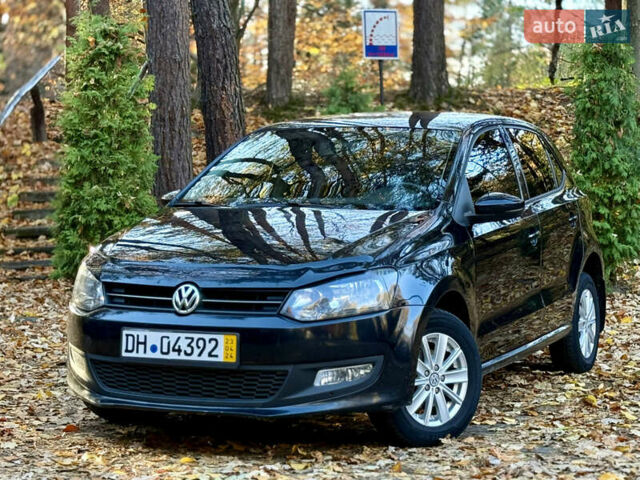 Черный Фольксваген Поло, объемом двигателя 1.39 л и пробегом 143 тыс. км за 7850 $, фото 1 на Automoto.ua