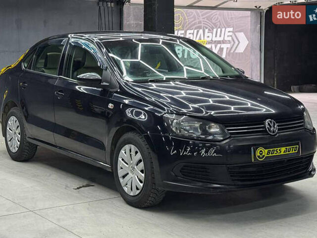 Черный Фольксваген Поло, объемом двигателя 1.6 л и пробегом 226 тыс. км за 7500 $, фото 1 на Automoto.ua