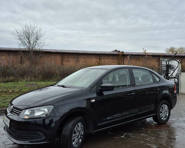 Черный Фольксваген Поло, объемом двигателя 1.6 л и пробегом 181 тыс. км за 6600 $, фото 1 на Automoto.ua