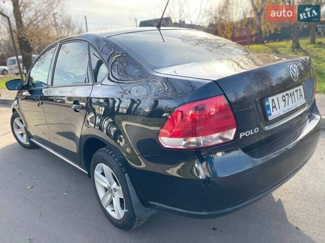 Чорний Фольксваген Поло, об'ємом двигуна 1.6 л та пробігом 184 тис. км за 6700 $, фото 1 на Automoto.ua