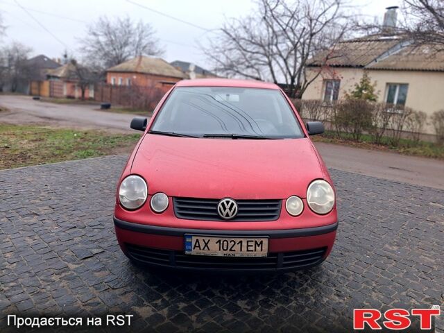 Красный Фольксваген Поло, объемом двигателя 1.4 л и пробегом 220 тыс. км за 2400 $, фото 1 на Automoto.ua