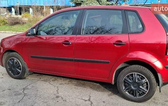 Красный Фольксваген Поло, объемом двигателя 1.4 л и пробегом 99 тыс. км за 6599 $, фото 1 на Automoto.ua
