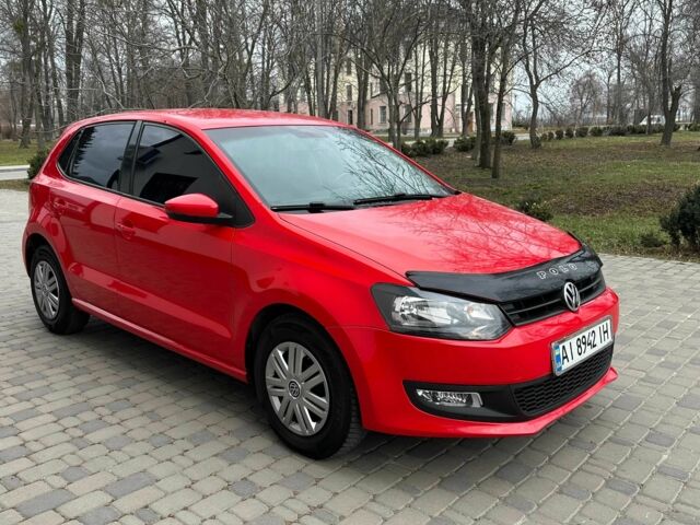Красный Фольксваген Поло, объемом двигателя 1.4 л и пробегом 158 тыс. км за 6850 $, фото 1 на Automoto.ua