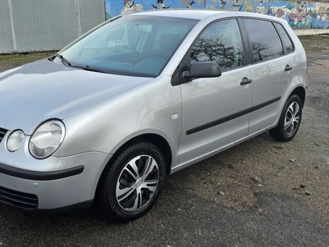 Серый Фольксваген Поло, объемом двигателя 1.4 л и пробегом 247 тыс. км за 4500 $, фото 1 на Automoto.ua