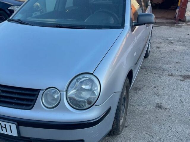 Серый Фольксваген Поло, объемом двигателя 1.4 л и пробегом 320 тыс. км за 1999 $, фото 1 на Automoto.ua