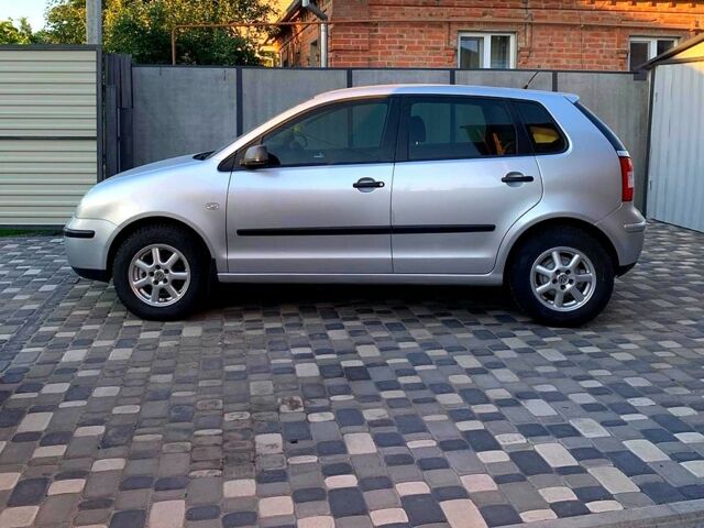 Серый Фольксваген Поло, объемом двигателя 1.4 л и пробегом 219 тыс. км за 4800 $, фото 1 на Automoto.ua