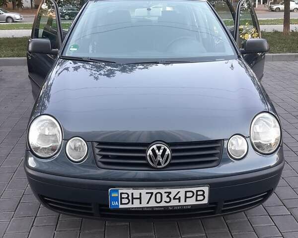 Серый Фольксваген Поло, объемом двигателя 1.2 л и пробегом 205 тыс. км за 4700 $, фото 1 на Automoto.ua