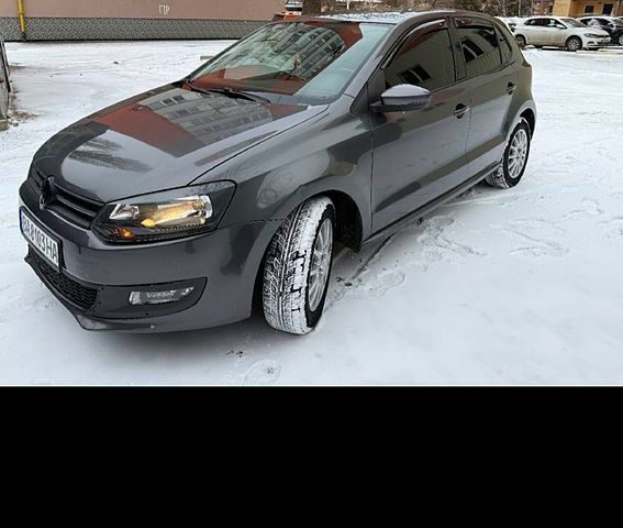 Серый Фольксваген Поло, объемом двигателя 1.4 л и пробегом 210 тыс. км за 5600 $, фото 1 на Automoto.ua