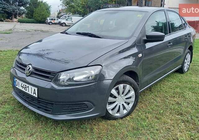 Серый Фольксваген Поло, объемом двигателя 1.6 л и пробегом 200 тыс. км за 4550 $, фото 1 на Automoto.ua