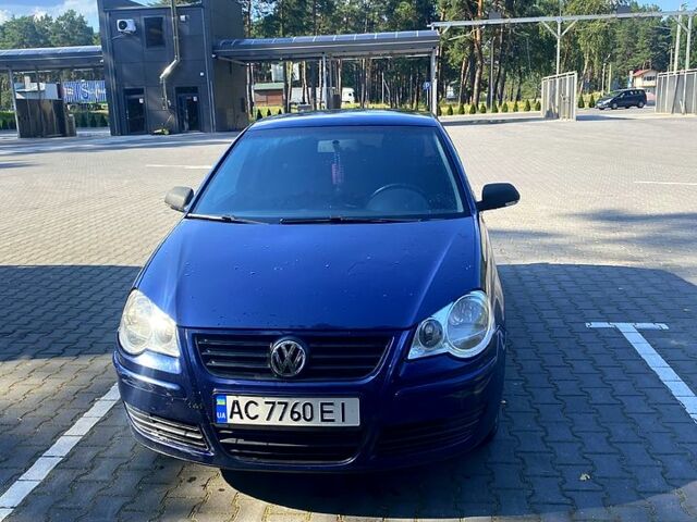 Синий Фольксваген Поло, объемом двигателя 1.2 л и пробегом 244 тыс. км за 3400 $, фото 1 на Automoto.ua
