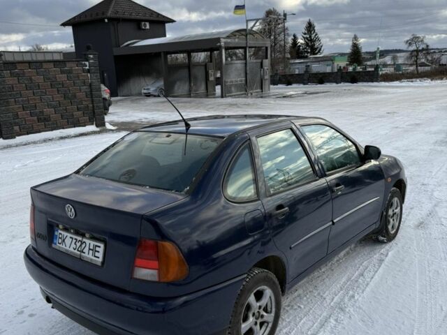 Синий Фольксваген Поло, объемом двигателя 1.4 л и пробегом 200 тыс. км за 1450 $, фото 1 на Automoto.ua