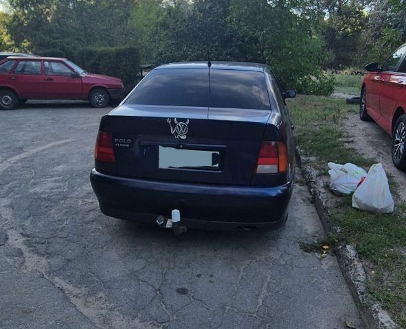 Синий Фольксваген Поло, объемом двигателя 1.4 л и пробегом 290 тыс. км за 1900 $, фото 1 на Automoto.ua