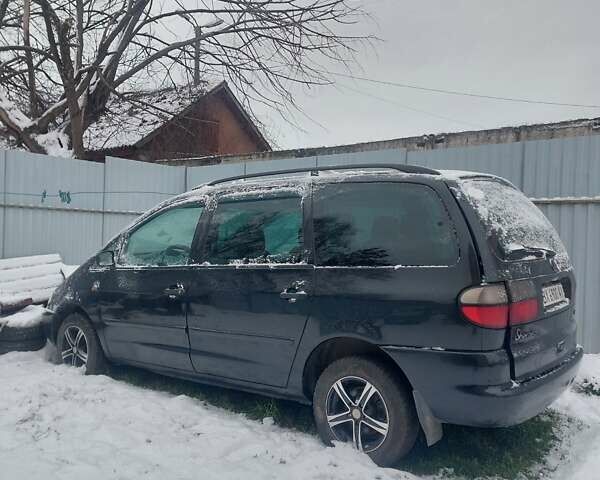 Черный Фольксваген Шаран, объемом двигателя 1.78 л и пробегом 280 тыс. км за 1700 $, фото 1 на Automoto.ua