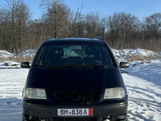 Черный Фольксваген Шаран, объемом двигателя 1.9 л и пробегом 250 тыс. км за 1970 $, фото 1 на Automoto.ua