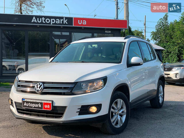 Білий Фольксваген Тігуан, об'ємом двигуна 2 л та пробігом 208 тис. км за 13890 $, фото 1 на Automoto.ua