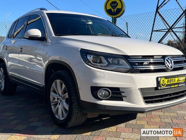Белый Фольксваген Тигуан, объемом двигателя 2 л и пробегом 203 тыс. км за 15999 $, фото 1 на Automoto.ua