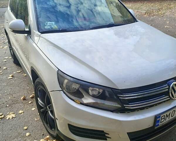 Белый Фольксваген Тигуан, объемом двигателя 1.97 л и пробегом 240 тыс. км за 10000 $, фото 1 на Automoto.ua