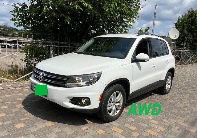 Белый Фольксваген Тигуан, объемом двигателя 2 л и пробегом 200 тыс. км за 14000 $, фото 1 на Automoto.ua