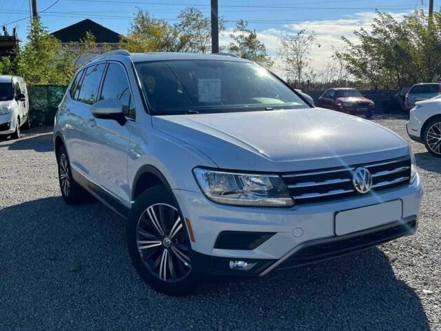 Білий Фольксваген Тігуан, об'ємом двигуна 2 л та пробігом 201 тис. км за 18600 $, фото 1 на Automoto.ua