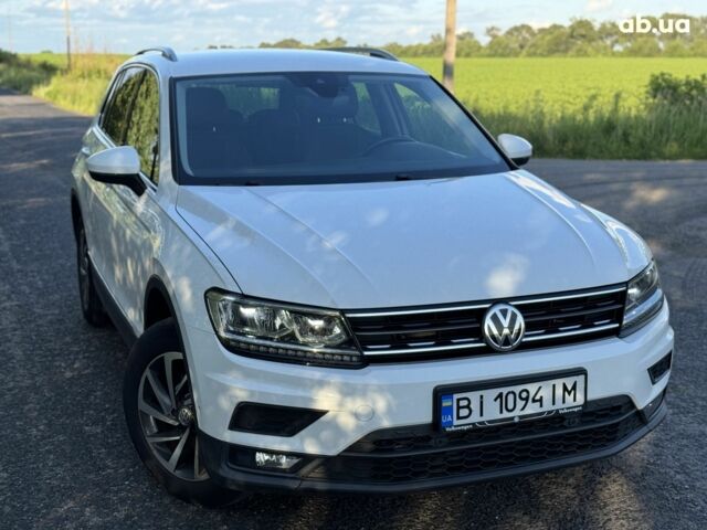 Білий Фольксваген Тігуан, об'ємом двигуна 2 л та пробігом 243 тис. км за 21500 $, фото 1 на Automoto.ua