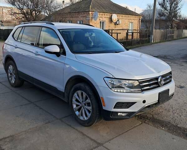 Белый Фольксваген Тигуан, объемом двигателя 2 л и пробегом 243 тыс. км за 13700 $, фото 1 на Automoto.ua