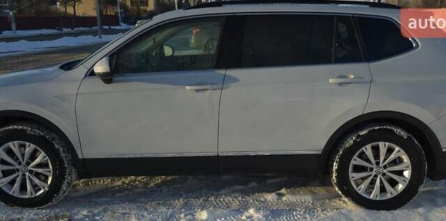 Білий Фольксваген Тігуан, об'ємом двигуна 2 л та пробігом 95 тис. км за 22300 $, фото 1 на Automoto.ua