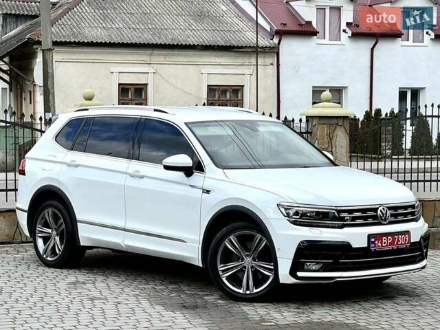 Белый Фольксваген Тигуан, объемом двигателя 2 л и пробегом 143 тыс. км за 30399 $, фото 1 на Automoto.ua