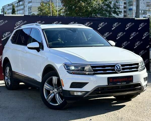 Белый Фольксваген Тигуан, объемом двигателя 2 л и пробегом 120 тыс. км за 24200 $, фото 1 на Automoto.ua