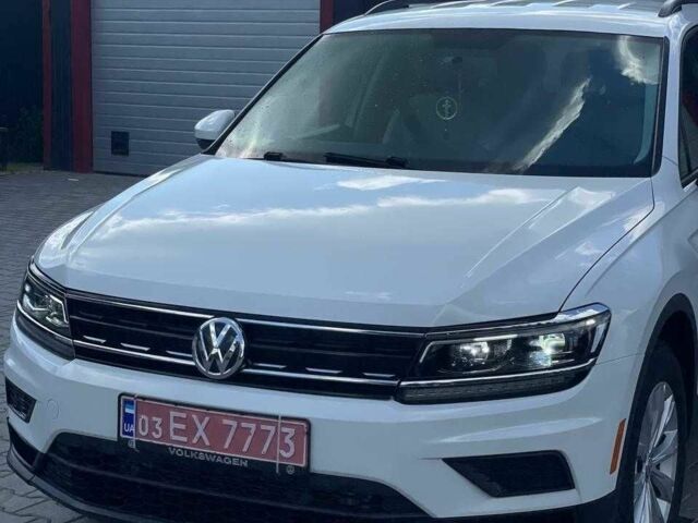 Белый Фольксваген Тигуан, объемом двигателя 2 л и пробегом 198 тыс. км за 16000 $, фото 1 на Automoto.ua