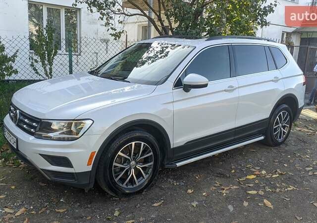 Белый Фольксваген Тигуан, объемом двигателя 2 л и пробегом 106 тыс. км за 22700 $, фото 1 на Automoto.ua