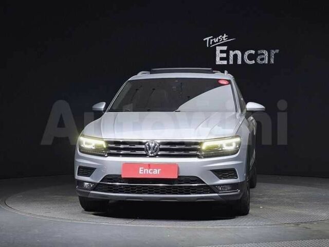 Белый Фольксваген Тигуан, объемом двигателя 2 л и пробегом 57 тыс. км за 16200 $, фото 1 на Automoto.ua