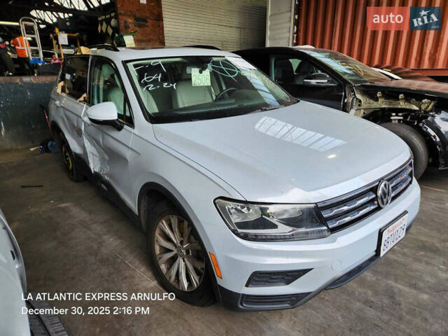 Белый Фольксваген Тигуан, объемом двигателя 2 л и пробегом 100 тыс. км за 11600 $, фото 1 на Automoto.ua