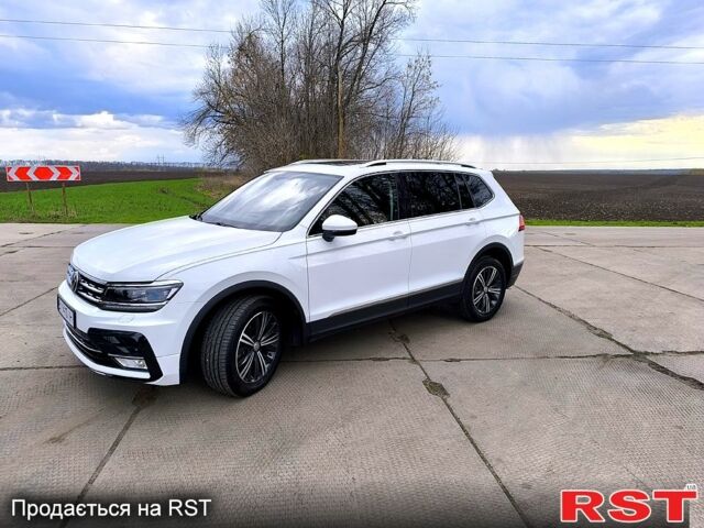 Білий Фольксваген Тігуан, об'ємом двигуна 2 л та пробігом 116 тис. км за 23000 $, фото 1 на Automoto.ua
