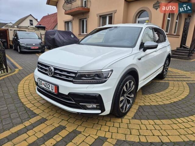 Білий Фольксваген Тігуан, об'ємом двигуна 2 л та пробігом 245 тис. км за 28900 $, фото 1 на Automoto.ua