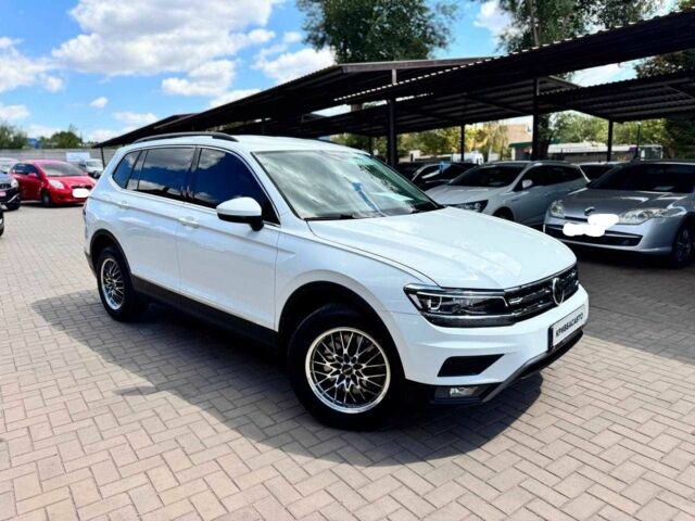 Білий Фольксваген Тігуан, об'ємом двигуна 2 л та пробігом 105 тис. км за 19500 $, фото 1 на Automoto.ua