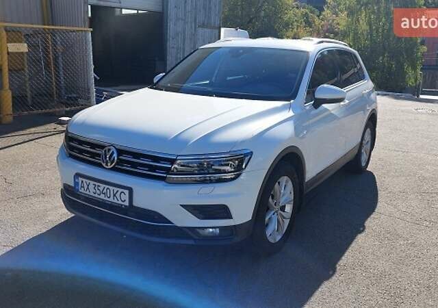 Белый Фольксваген Тигуан, объемом двигателя 1.98 л и пробегом 164 тыс. км за 21937 $, фото 1 на Automoto.ua